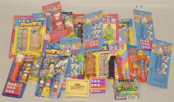 LOT OF ASSORTED MODERN PEZ DISPENSERS IN BOXES.   