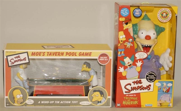 LOT OF SIMPSONS TOYS IN BOXES.                    