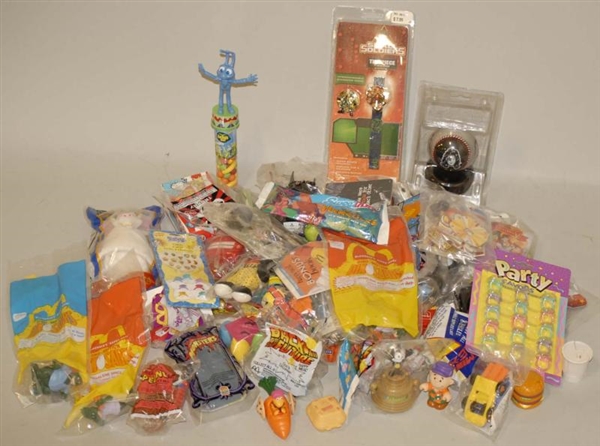 LOT OF ASSORTED CHARACTER TOYS IN BOXES.          