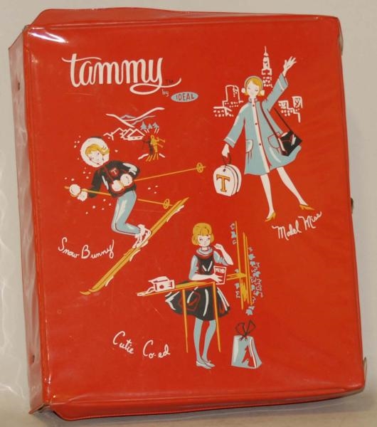 TAMMY DOLL IN RED PLASTIC WARDROBE CASE.          