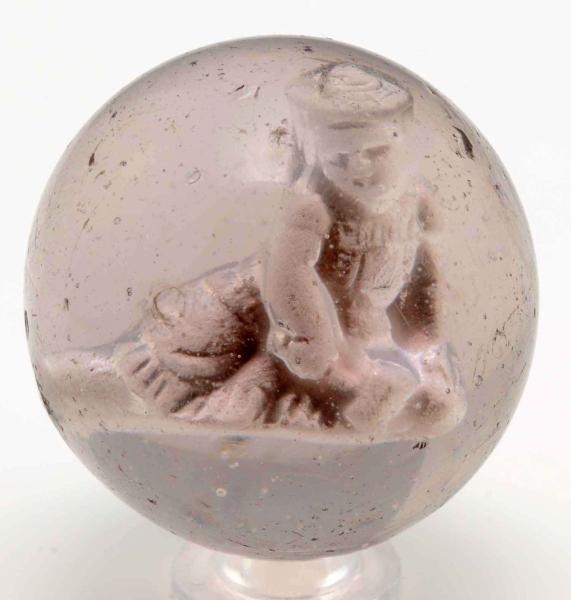 SEATED GIRL IN DRESS & HAT SULPHIDE MARBLE.       