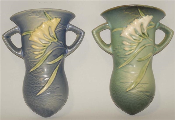 PAIR OF ROSEVILLE FREESIA WALL POCKETS.           