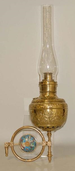 ANTIQUE BRASS KEROSENE WALL LAMP.                 