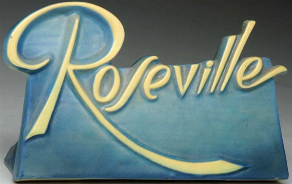 ROSEVILLE BLUE SCRIPT DEALER SIGN.                