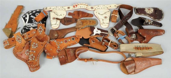 LOT OF ASSORTED GUN HOLSTERS.                     