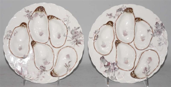 LOT OF 2: ROUND MATCHING OYSTER PLATES.           