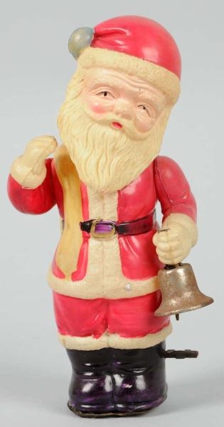 CELLULOID SANTA CLAUS WIND-UP TOY.                
