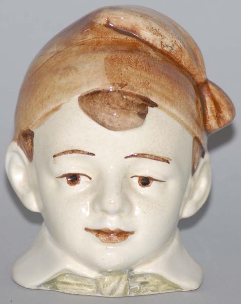 POTTERY BOY WITH HAT STILL BANK.                  