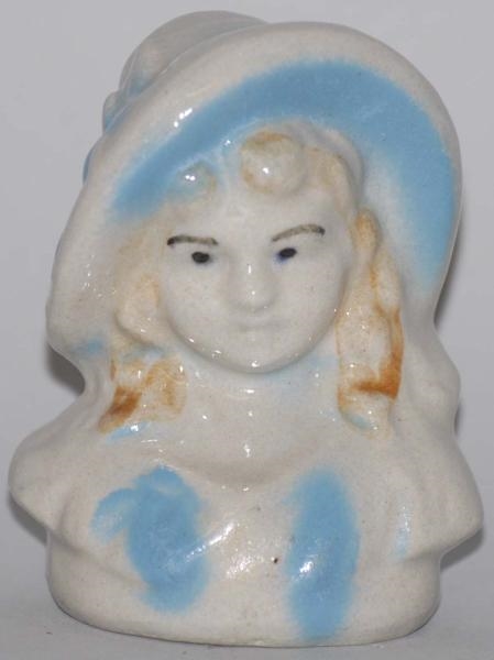 POTTERY GIRL WITH HAT & PIGTAILS STILL BANK.      
