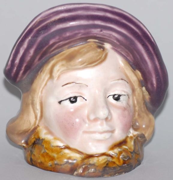 POTTERY LADY WITH PURPLE HAT STILL BANK.          