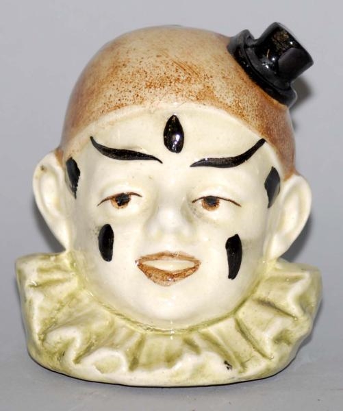 POTTERY CLOWN WITH MINIATURE TOP HAT STILL BANK.  