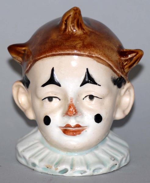 POTTERY CLOWN WITH BROWN HAT STILL BANK.          