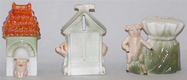LOT OF 3: POTTERY PIG BANKS.                      