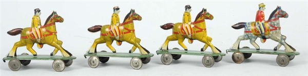 LOT OF 4: EARLY TIN LITHO PENNY TOYS.             