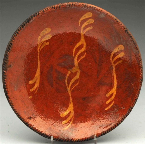 REDWARE SLIP WARE PAINTED POTTERY PLATE.          