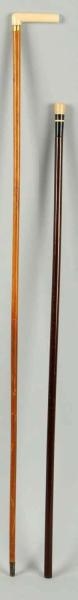 LOT OF 2: SMALL WOODEN CANES WITH IVORY HANDLES.  