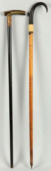 LOT OF 2: WOODEN CANES.                           