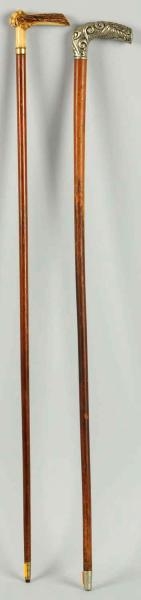LOT OF 2: WALKING CANES.                          