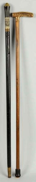 LOT OF 2: WALKING CANES.                          