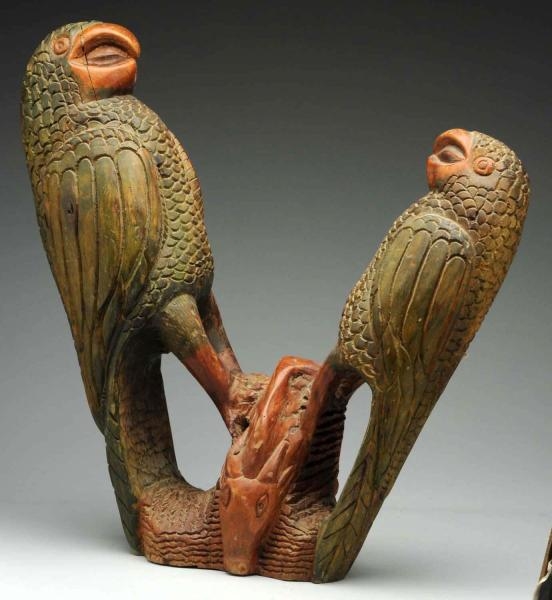 WOODEN CARVING OF TWO PARROTS.                    