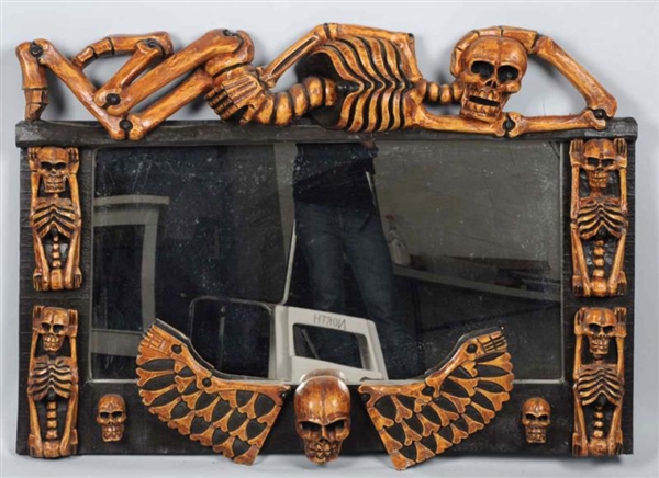 LARGE MIRROR WITH CARVED WOODEN SKELETON.         