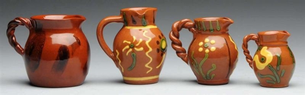 LOT OF 4: LESTER BREININGER WATER PITCHERS.       