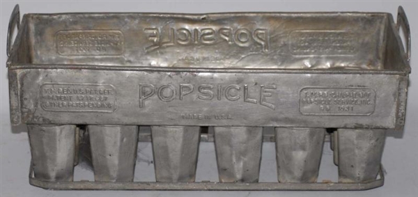 METAL POPSICLE MOLD.                              
