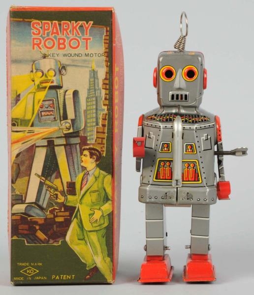 TIN LITHO WIND-UP SPARK ROBOT IN SILVER.          