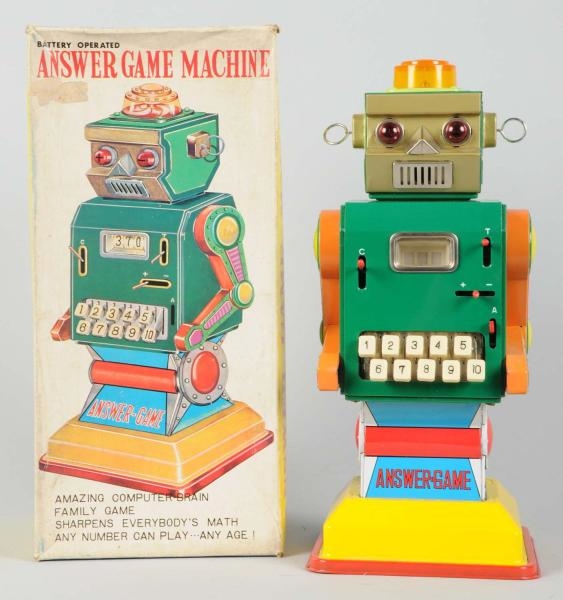 TIN LITHO & PAINTED ANSWER GAME MACHINE ROBOT.    