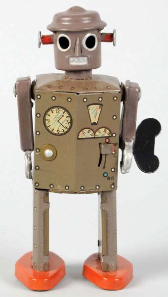 TIN LITHO WIND-UP ATOMIC ROBOT MAN.               
