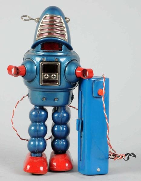 PAINTED TIN BATTERY-OPERATED PLANET ROBOT.        
