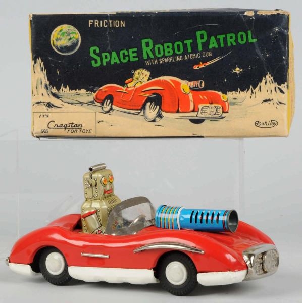 TIN LITHO & PAINTED SPACE ROBOT DRIVING MERCEDES. 