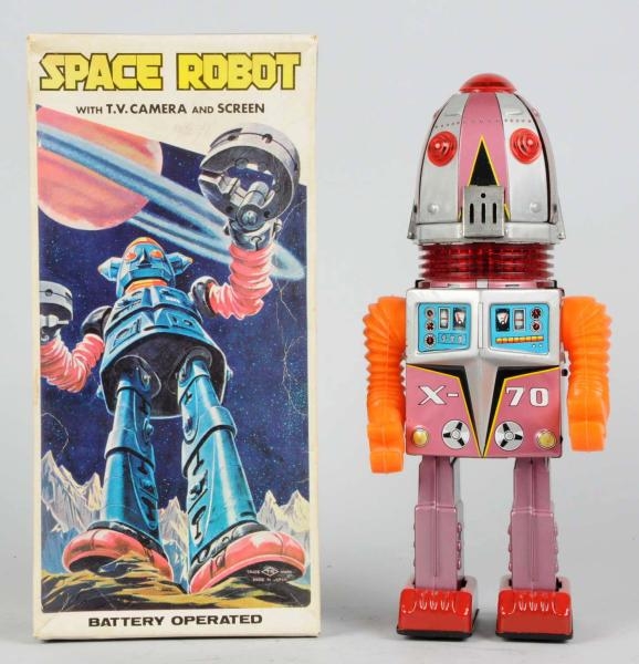 TIN LITHO & PAINTED SPACE ROBOT X-70.             