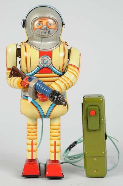 TIN LITHO & PAINTED BATTERY-OPERATED EARTH MAN.   