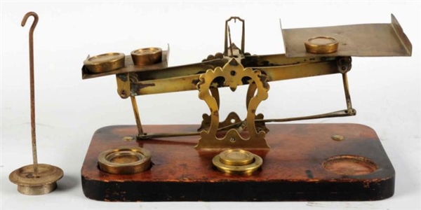 BRASS SCALE WITH WEIGHTS.                         