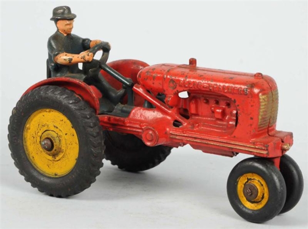 CAST IRON HUBLEY TRACTOR TOY.                     