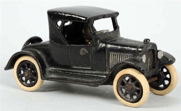 CAST IRON ARCADE CHEVY COUPE TOY.                 