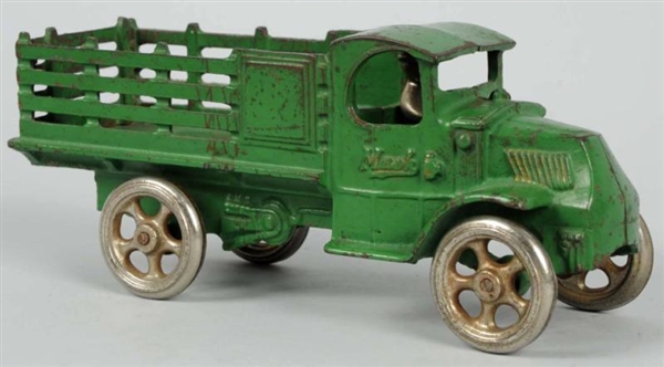 CAST IRON ARCADE MAC FRONT STAKE BACK TRUCK TOY.  