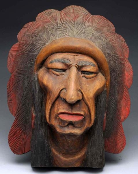 LARGE CARVED INDIAN CHIEF HEAD.                   