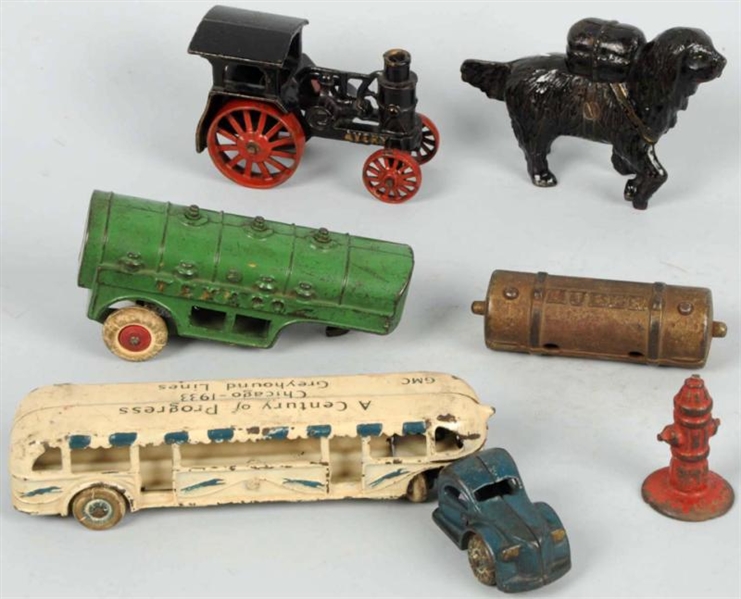 LOT OF CAST IRON VEHICLES & BANKS.                