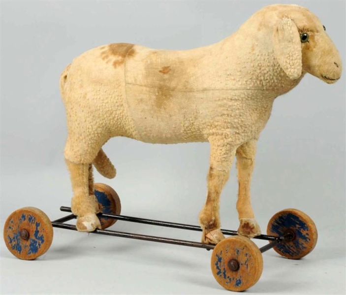 WOOL SHEEP PULL TOY.                              