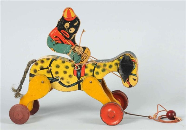 ALL-FAIR AFRICAN AMERICAN ON DONKEY PULL TOY.     