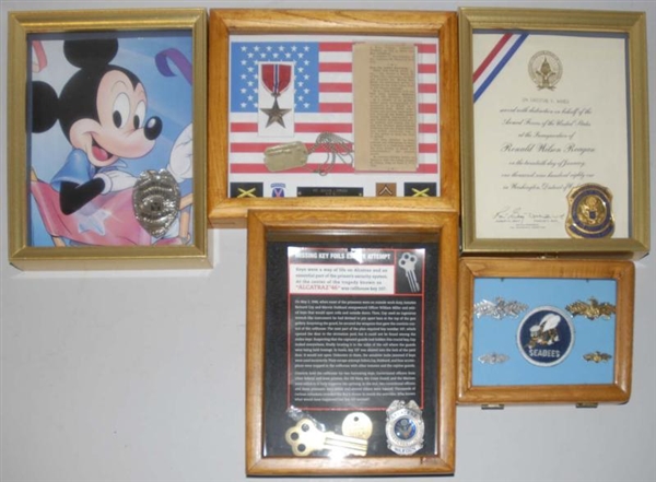 LOT OF FRAMED MILITARY MEDALS.                    