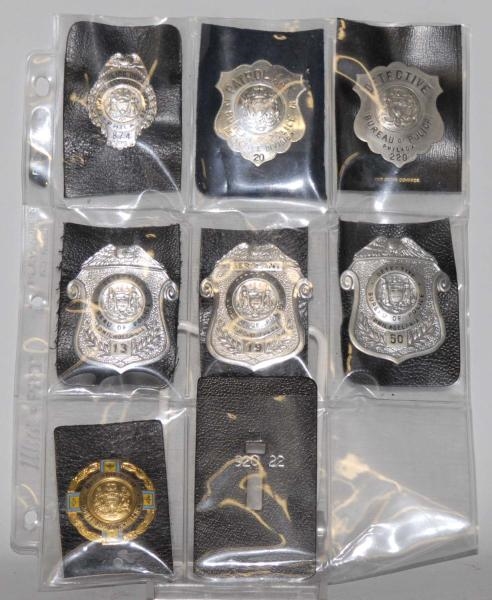 LOT OF 7 POLICE & DETECTIVE BADGES.               