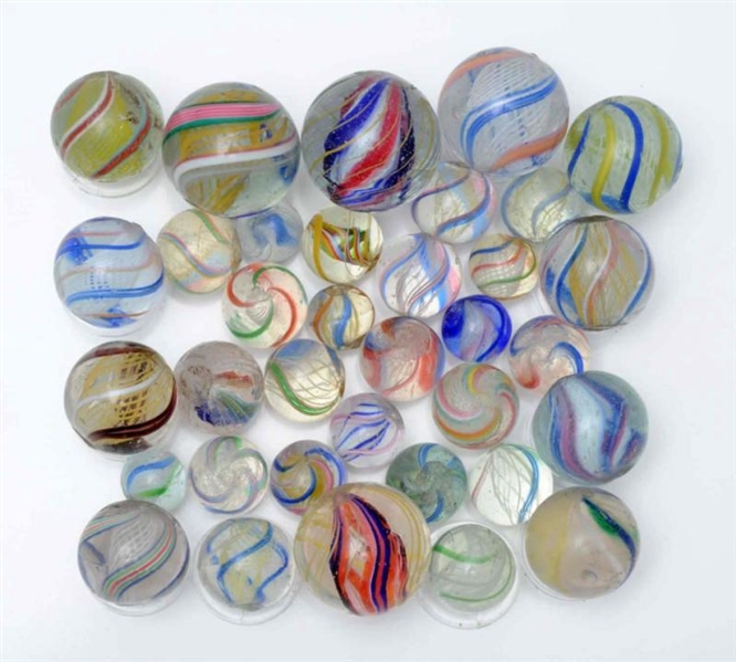 LOT OF 35: SWIRL MARBLES.                         