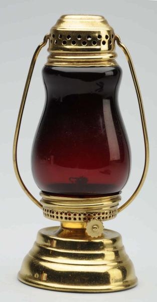 SKATERS LANTERN WITH RUBY RED GLASS.             