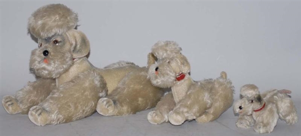 LOT OF 3; STUFFED POODLE DOGS.                    
