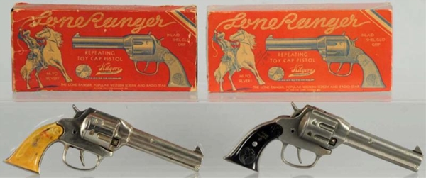 LOT OF 2: LONE RANGER CAST IRON GUNS IN BOXES.    