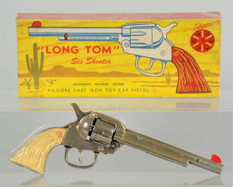 LONG TOM CAST IRON CAP GUN IN BOX.                