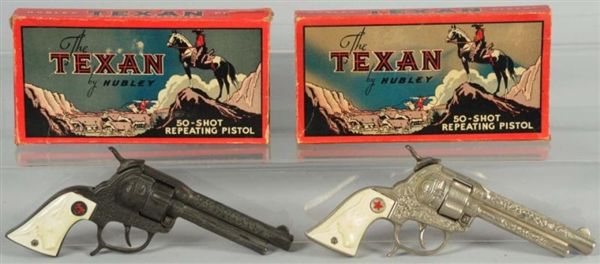 LOT OF 2: HUBLEY TEXAN GUNS IN BOXES.             